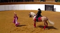 Willie Nelson and Julio Iglesias singing Spanish Eyes with a dancing horse in the backgound